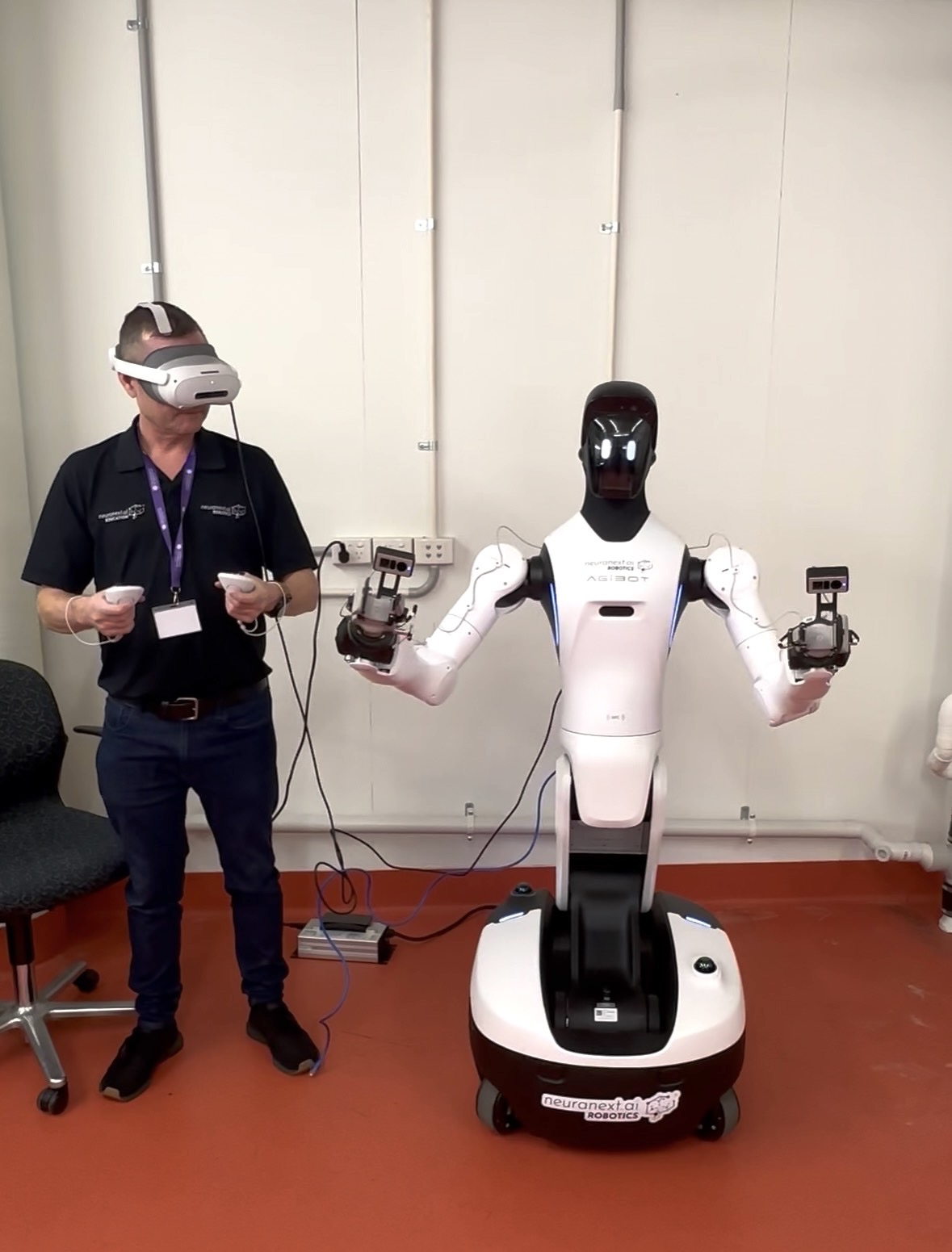 Adrian Tyson operating an Agibot humanoid robot